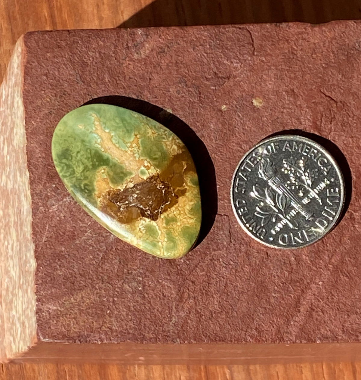 19 carat natural green Stone Mountain Turquoise cabochon with red matrix