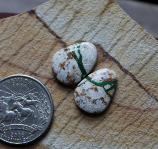 A pair of Stone Mountain Turquoise boulder-cut cabochons