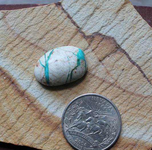 18 carat blue boulder-cut Stone Mountain Turquoise cabochon with a high dome