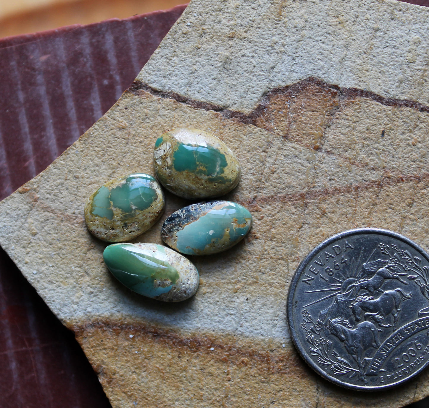 Four boulder-cut Stone Mountain Turquoise cabochons