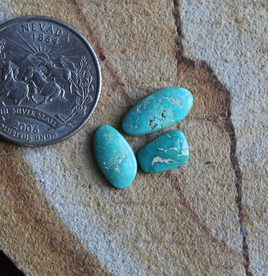 A trio of natural Blue June turquoise cabochons