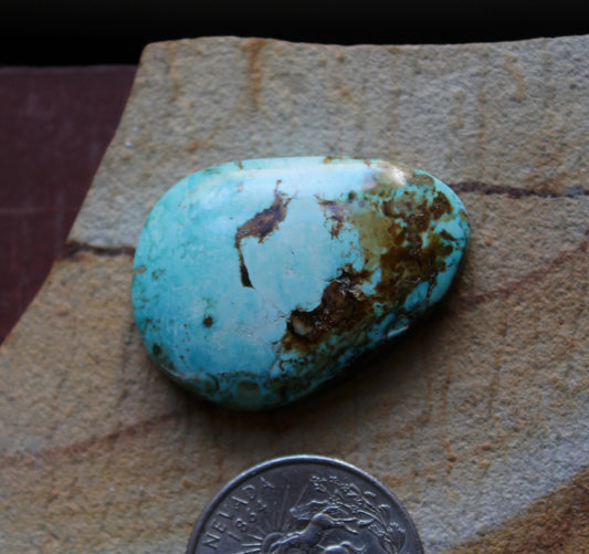 48 carat blue natural Blue June turquoise cabochon with a high dome