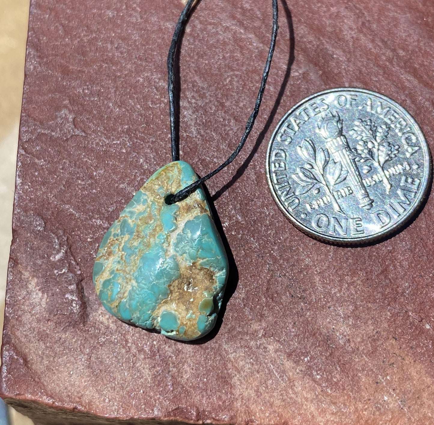 6 carat blue Stone Mountain Turquoise tab style bead