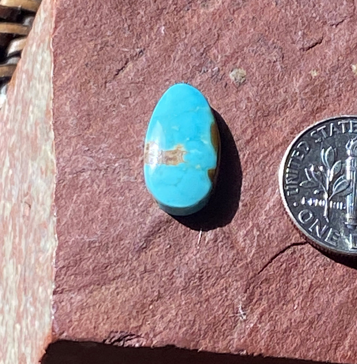4 carat blue natural Stone Mountain Turquoise cabochon with red matrix