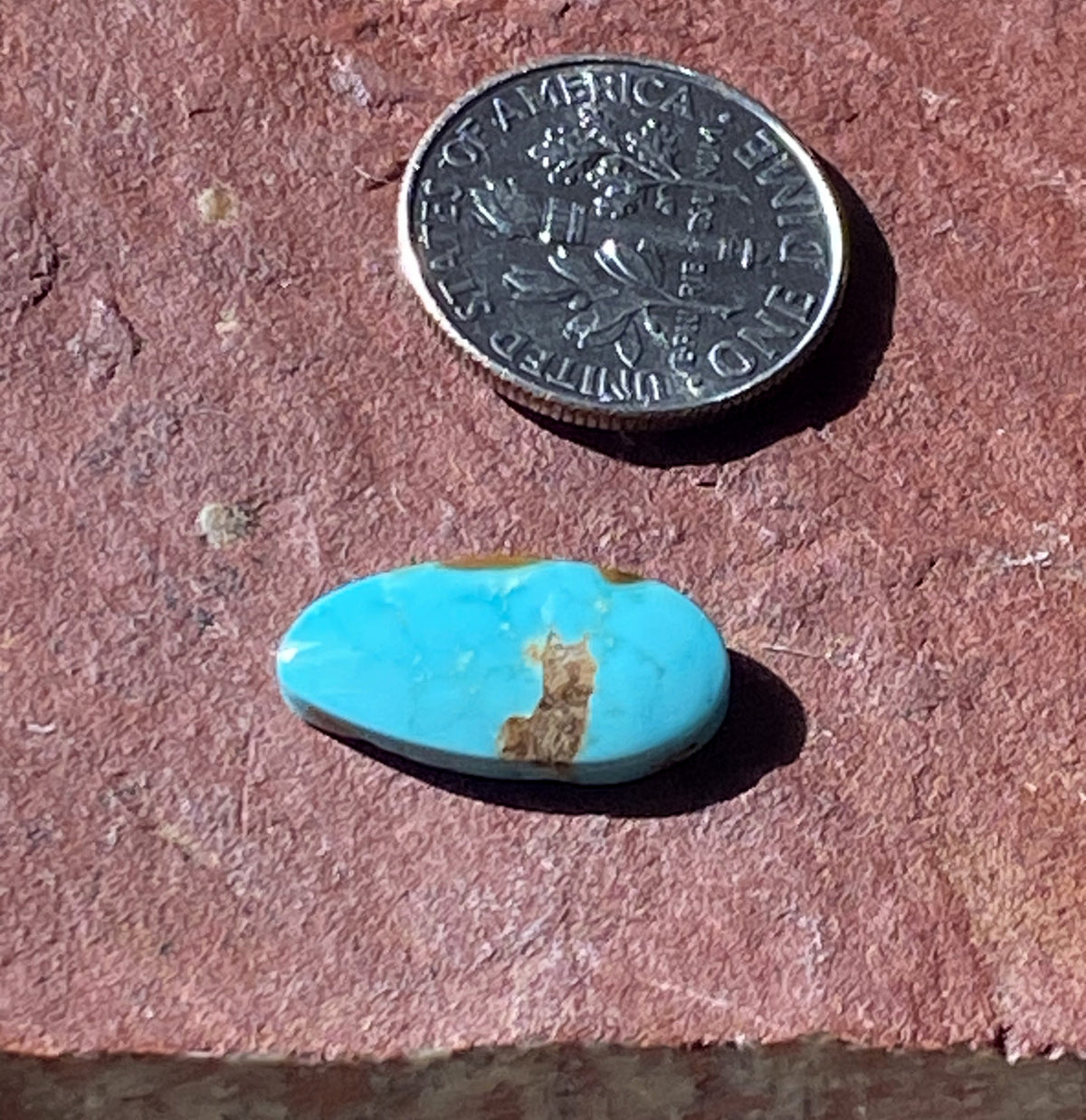 4 carat blue natural Stone Mountain Turquoise cabochon with red matrix