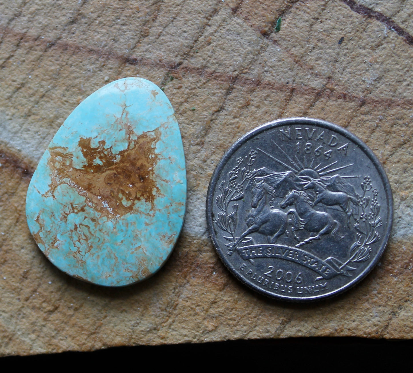 16 carat blue Stone Mountain Turquoise cabochon with red matrix