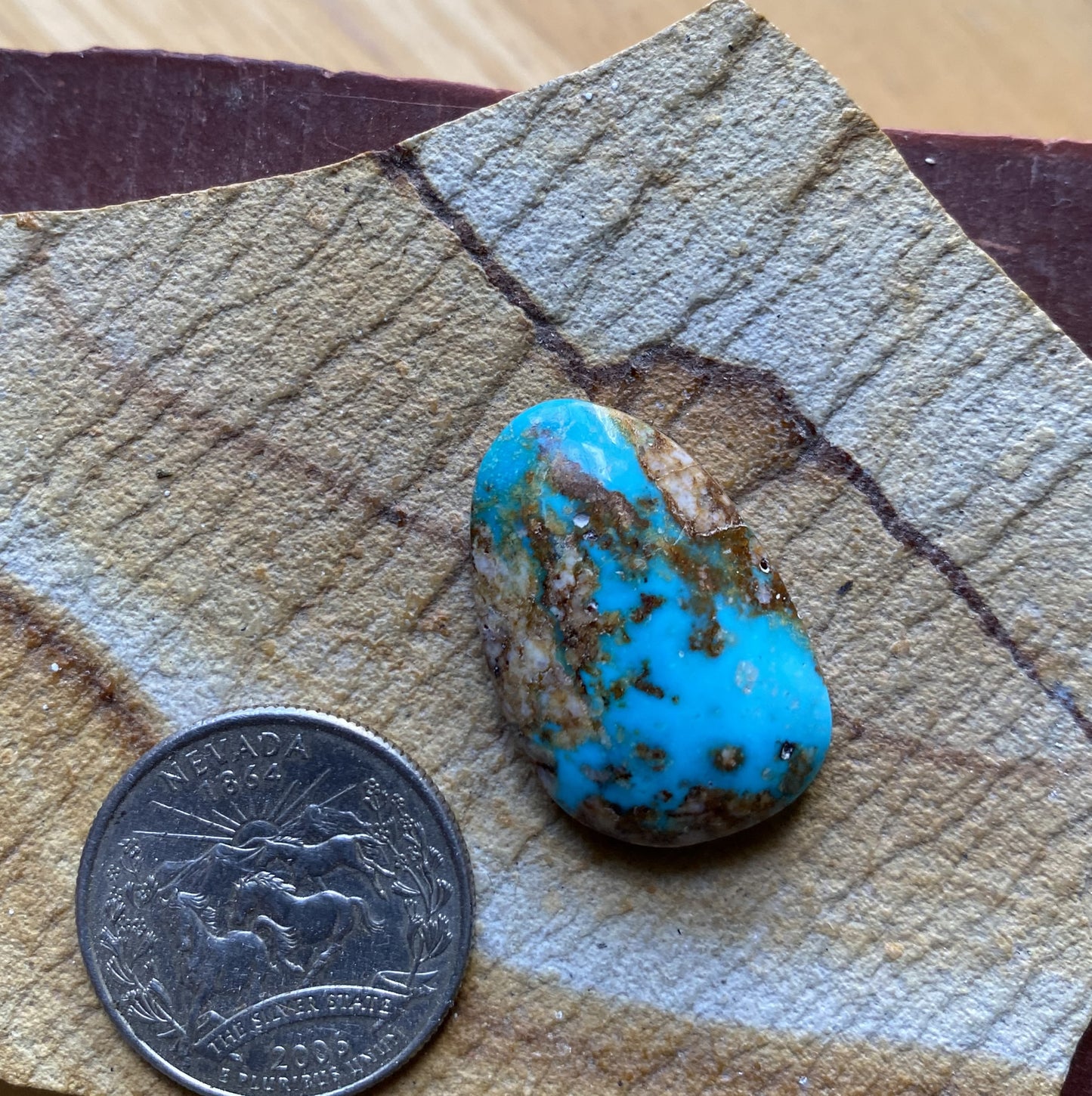 25 carat blue Stone Mountain turquoise cabochon with red matrix