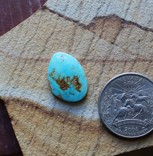 8 carat blue Stone Mountain Turquoise cabochon with red matrix