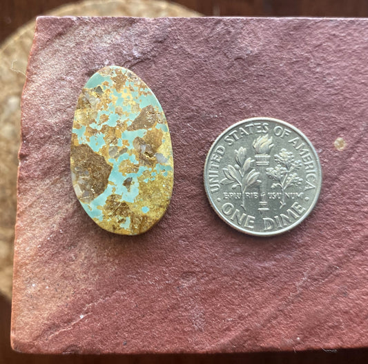 14 carat light blue Stone Mountain Turquoise cabochon with red matrix