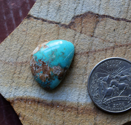 17 carat blue Stone Mountain Turquoise cabochon with red matrix