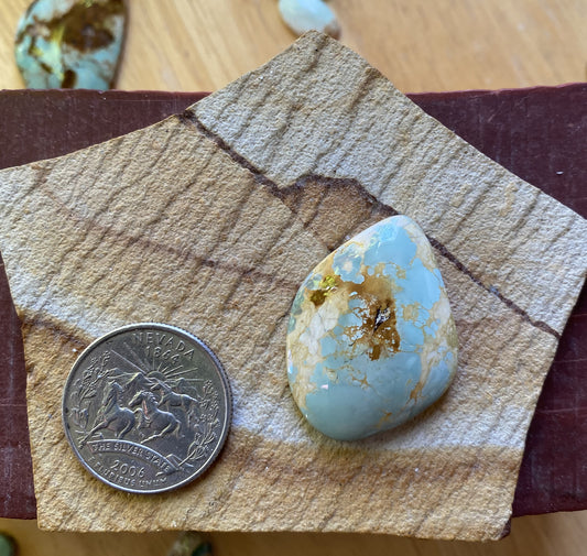 29 carat light blue Stone Mountain Turquoise cabochon with red matrix