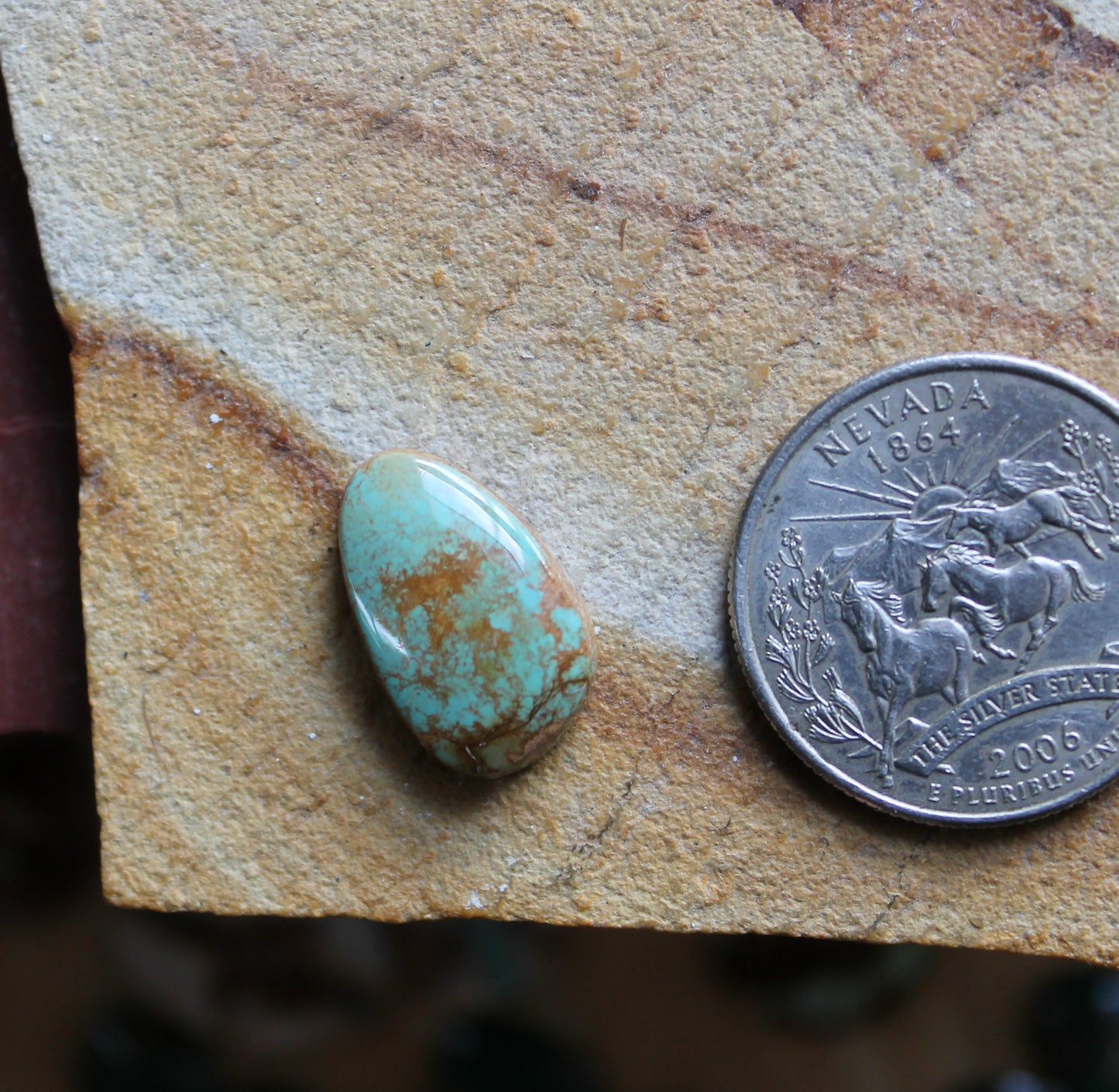 7 carat blue Stone Mountain Turquoise cabochon with red inclusions