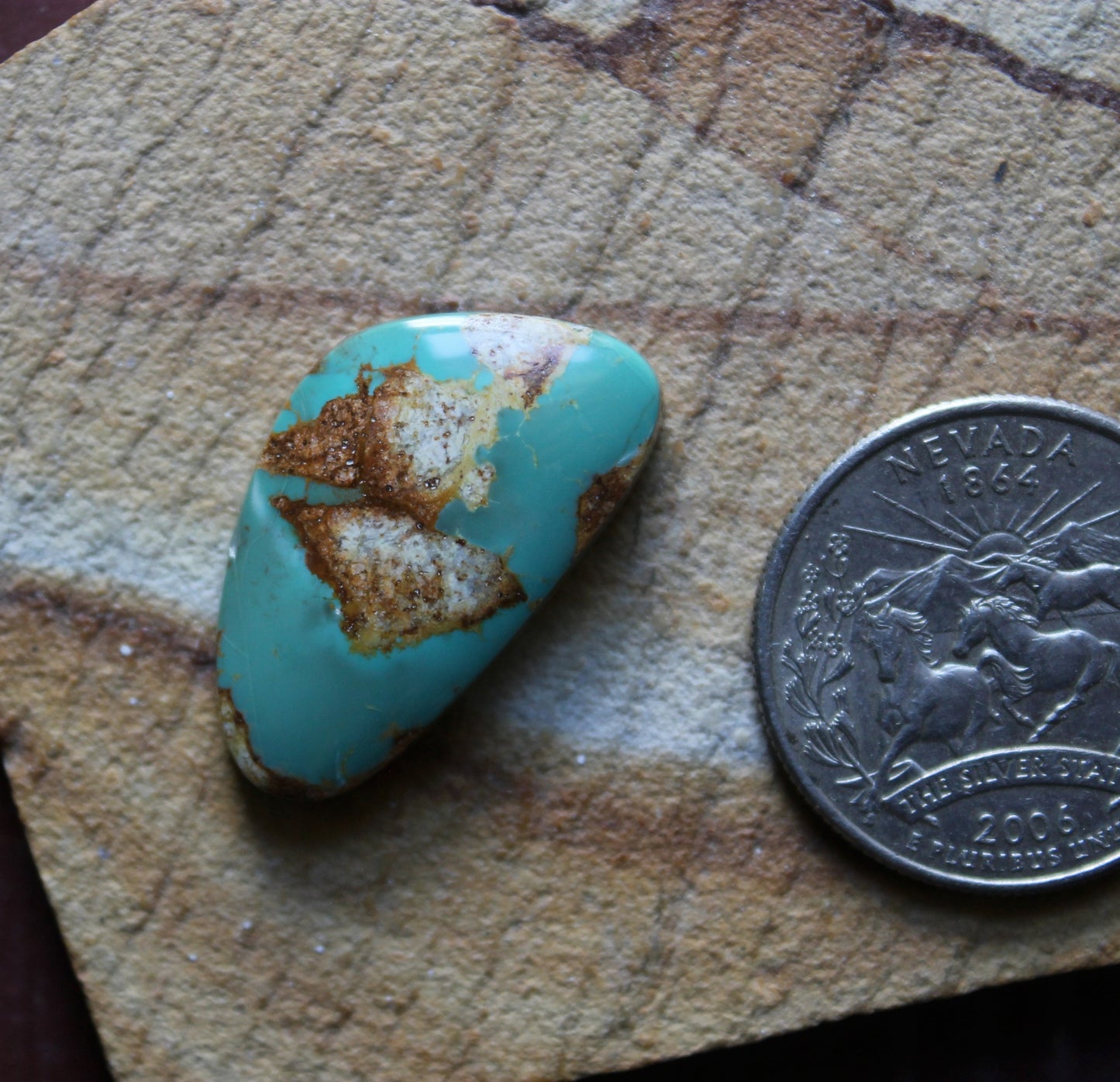 19 carat blue Stone Mountain Turquoise cabochon with red matrix