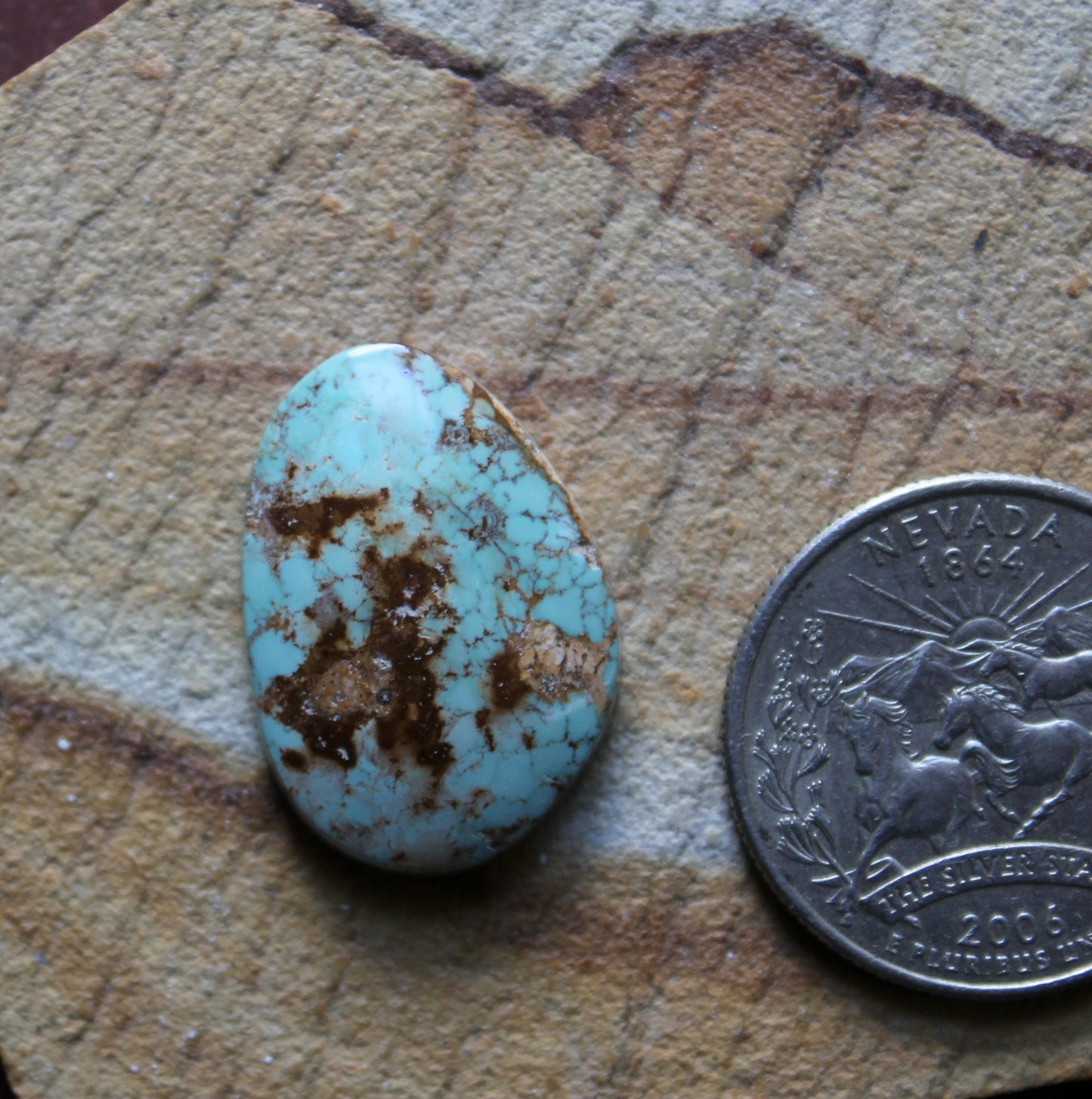 16 carat blue Stone Mountain Turquoise cabochon with red matrix