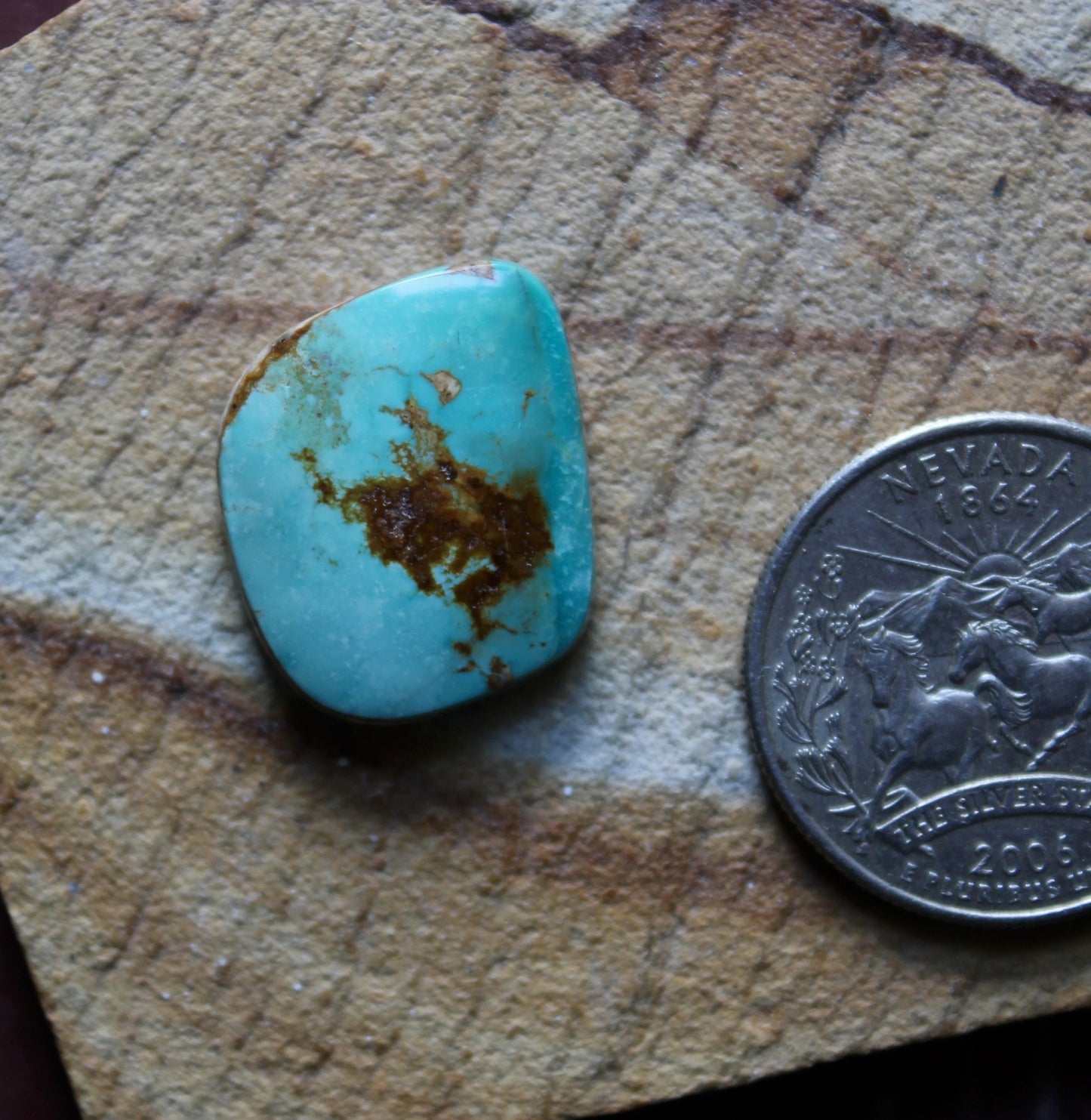 14 carat blue Stone Mountain Turquoise cabochon with red matrix