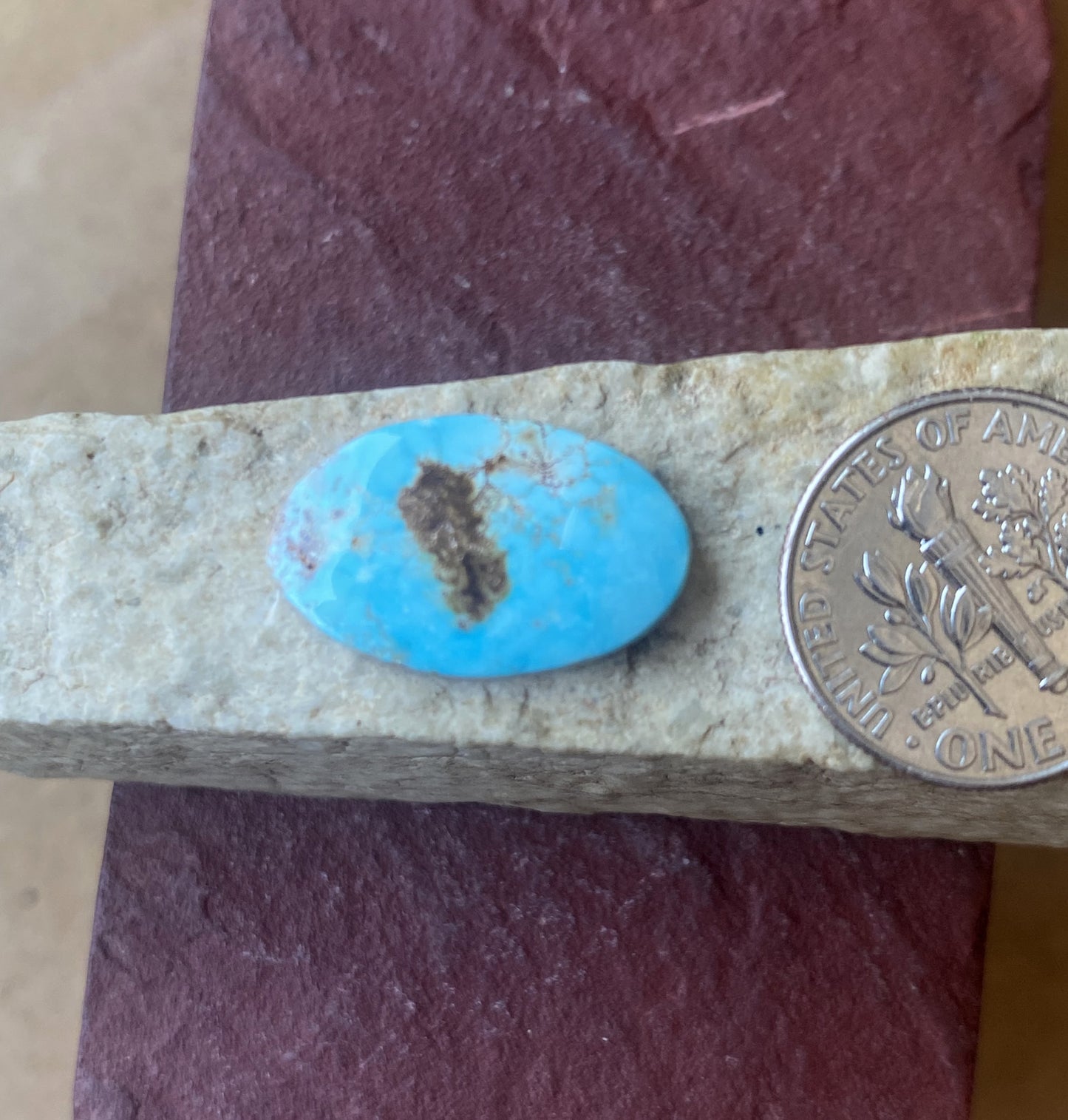 6 carat blue turquoise Stone Mountain Turquoise cabochon with red inclusions