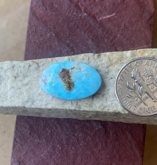 6 carat blue turquoise Stone Mountain Turquoise cabochon with red inclusions