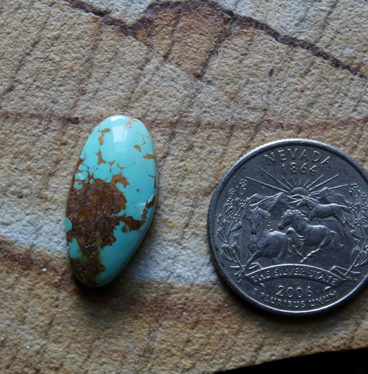 12 carat blue Stone Mountain Turquoise cabochon with red matrix