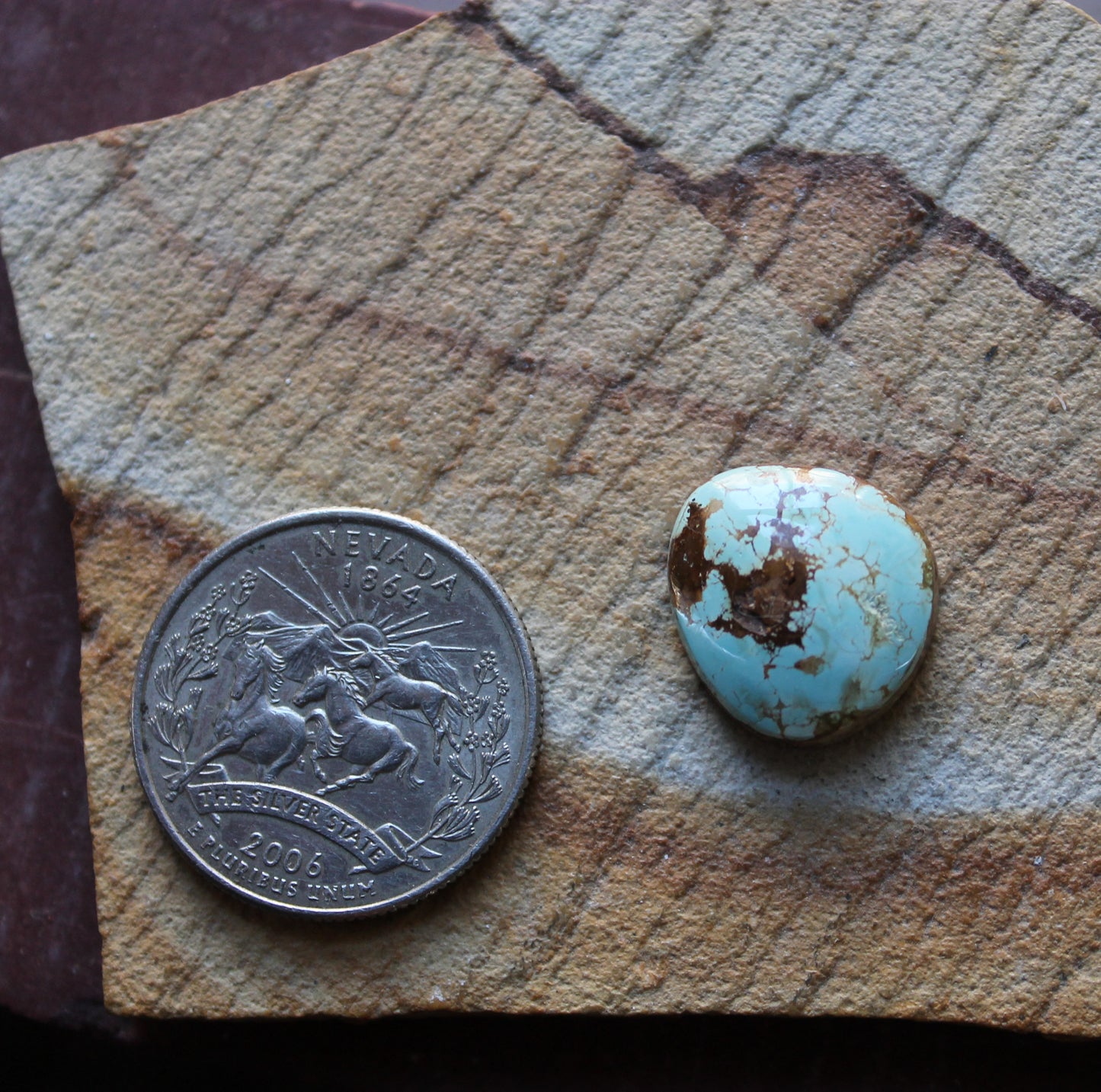 9 carat light blue Stone Mountain Turquoise cabochon with red matrix