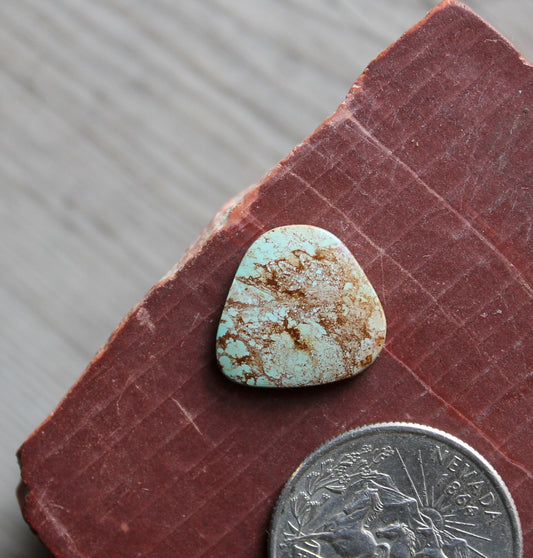 5 carat light blue Stone Mountain Turquoise cabochon with red inclusions