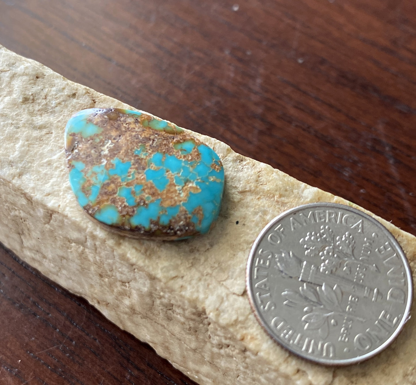8 carat dark blue Stone Mountain Turquoise cabochon with red matrix