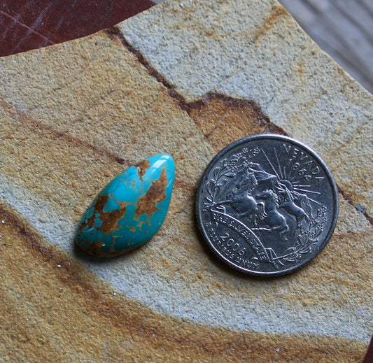 9 carat blue Stone Mountain Turquoise cabochon with red matrix