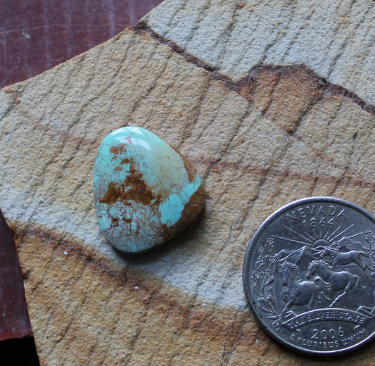 11 carat blue Stone Mountain Turquoise cabochon with red matrix