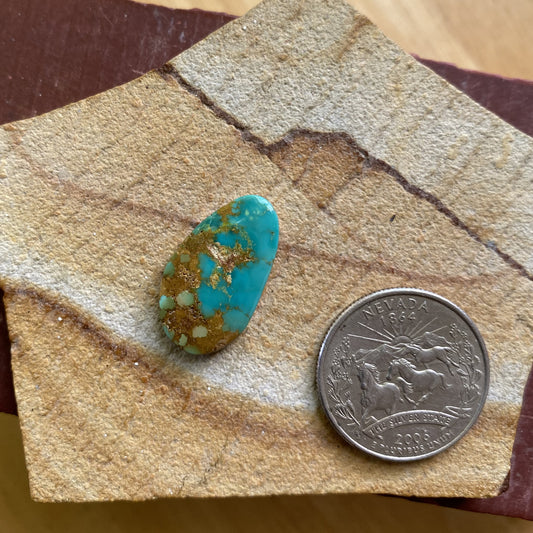 9 carat blue Stone Mountain Turquoise cabochon with red matrix