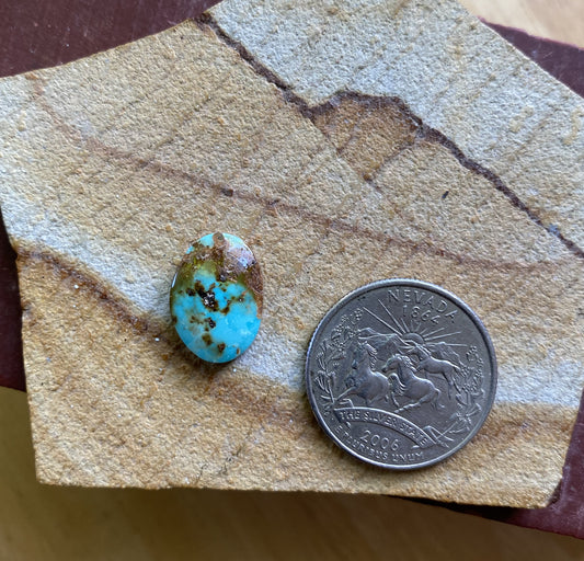 6 carat blue Stone Mountain Turquoise cabochon with red matrix