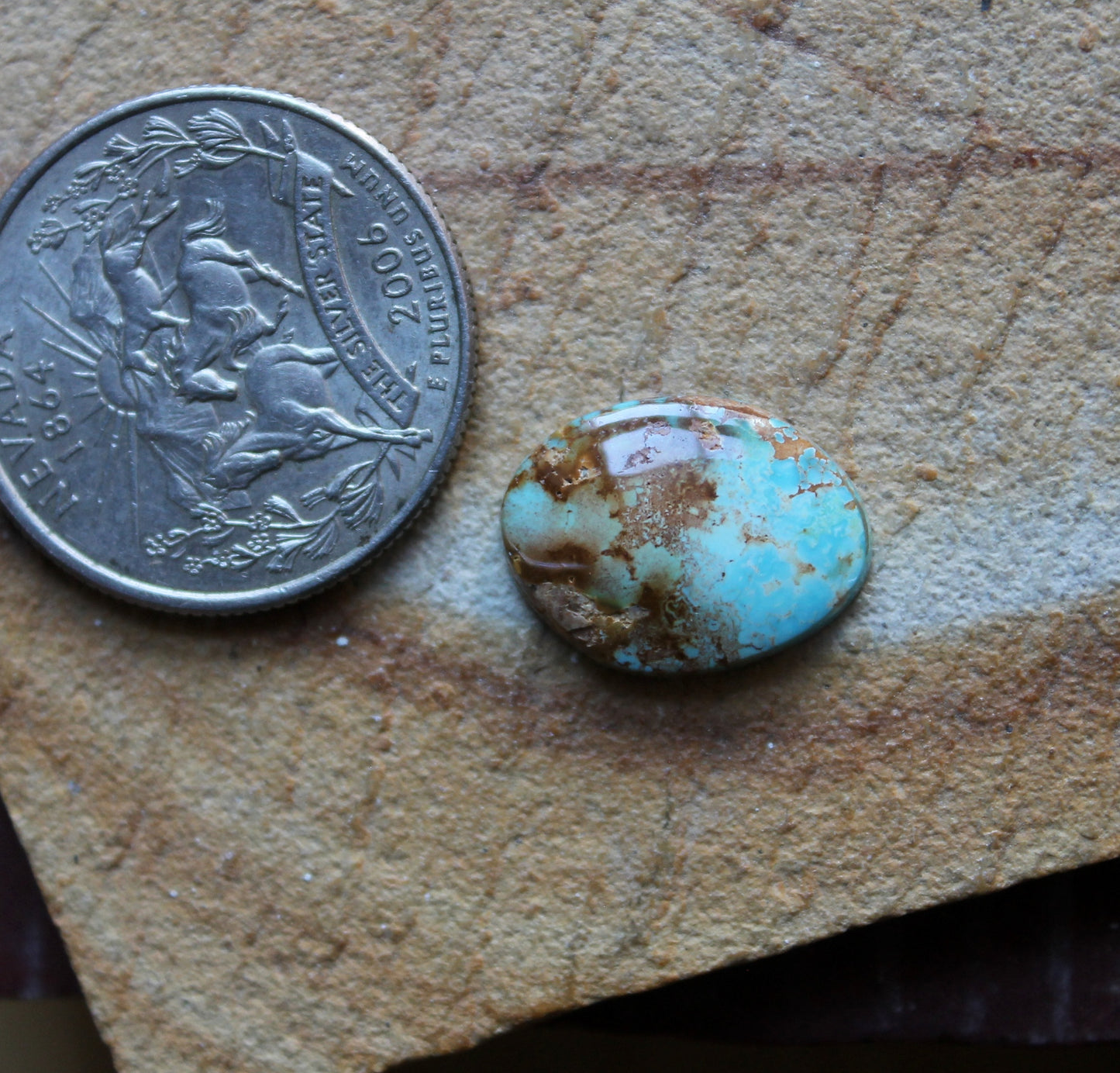 5 carat blue Stone Mountain Turquoise cabochon with red inclusions