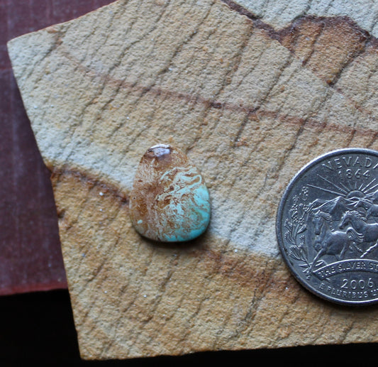 3 carat Stone Mountain Turquoise cabochon with a iron inclusions