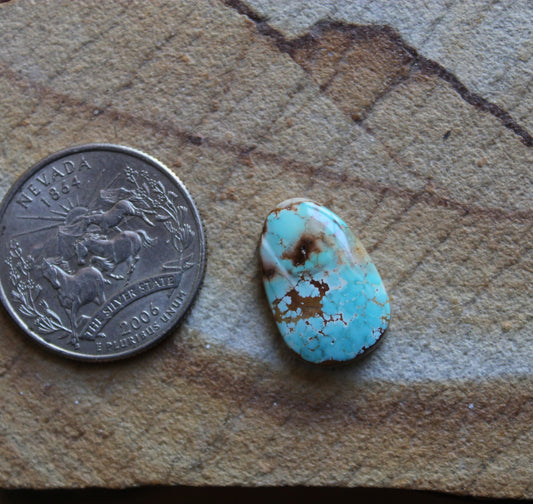 8 carat blue Stone Mountain Turquoise cabochon with red matrix