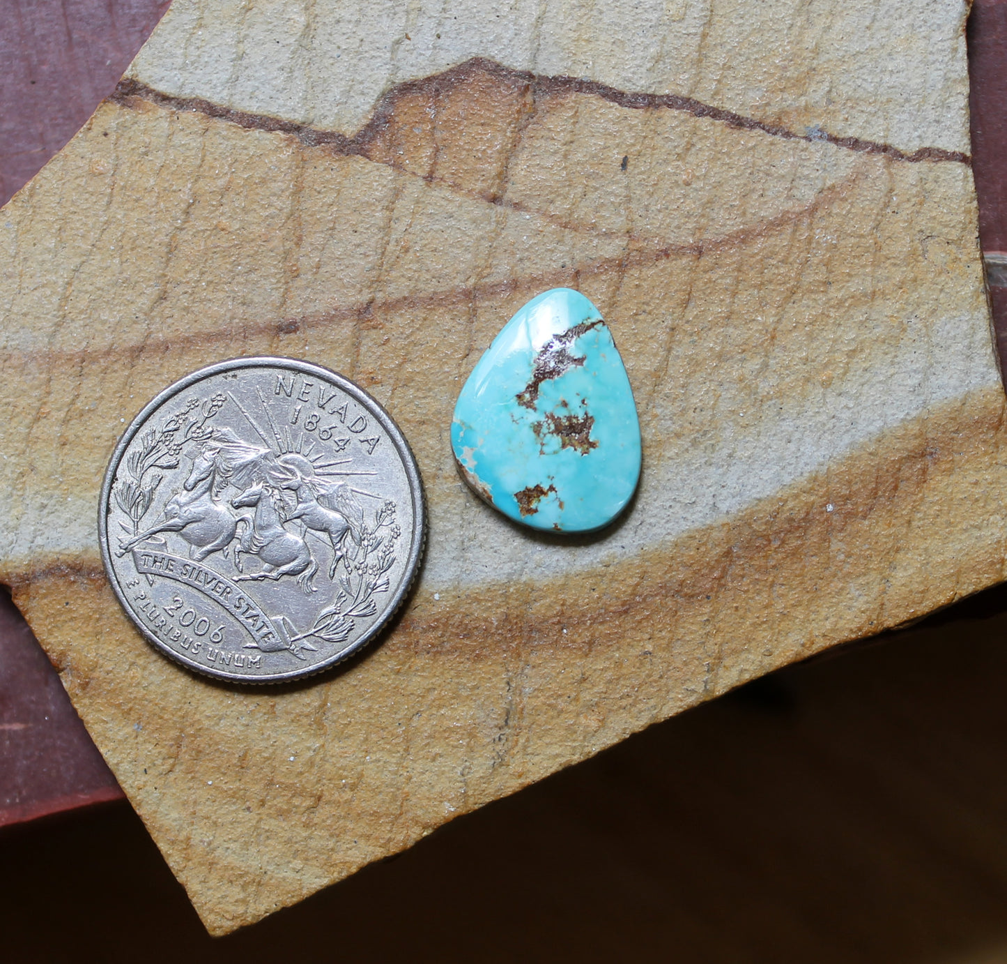 6 carat blue Stone Mountain Turquoise cabochon with red matrix