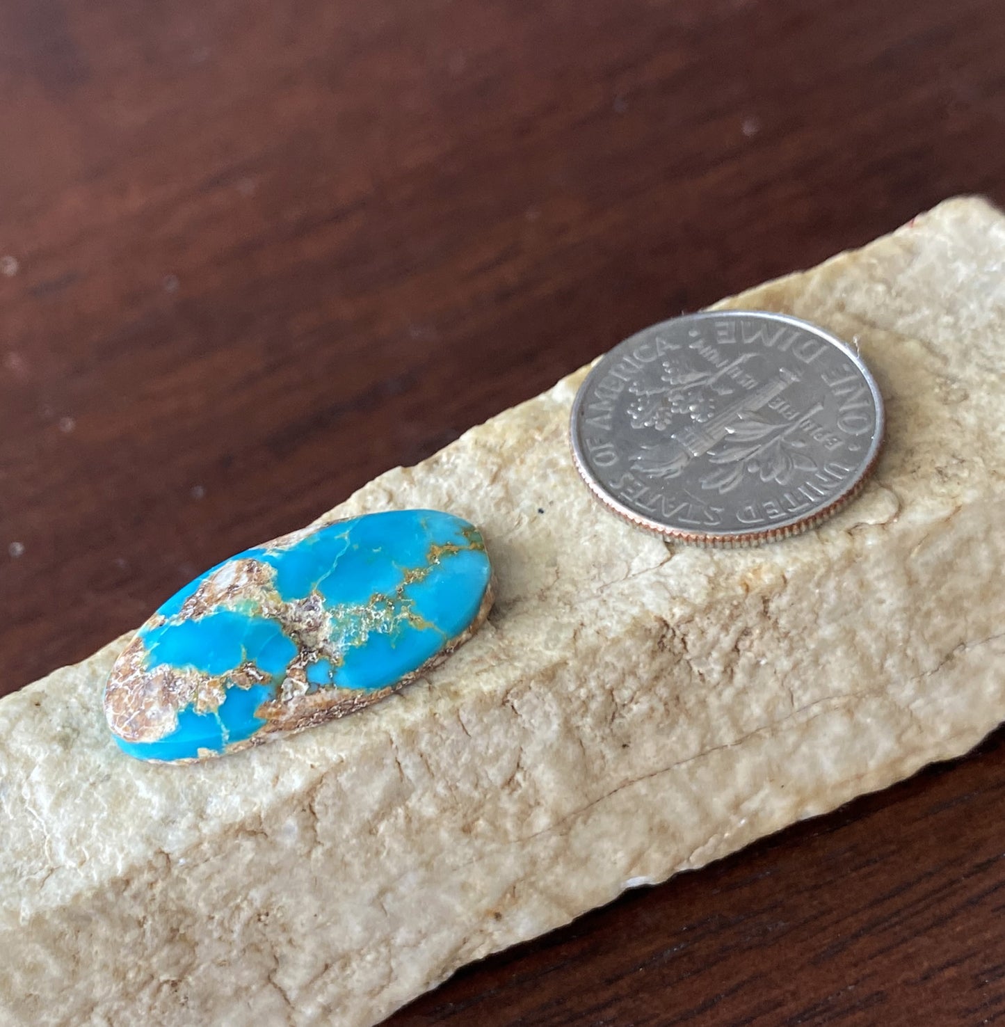 9 carat blue Stone Mountain Turquoise cabochon with red matrix
