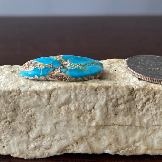 9 carat blue Stone Mountain Turquoise cabochon with red matrix