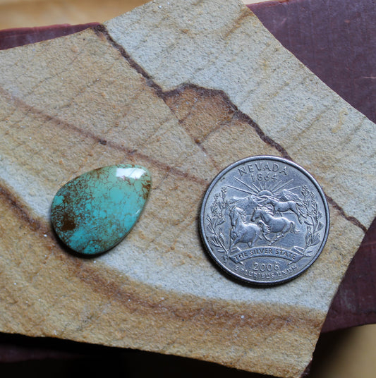 9 carat blue Stone Mountain Turquoise cabochon with red inclusions