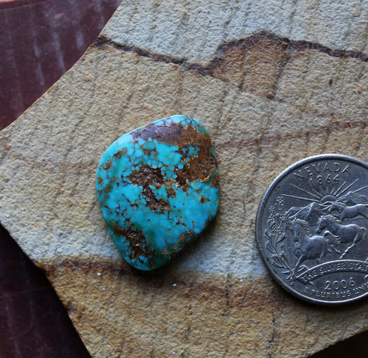 14 carat blue Stone Mountain Turquoise cabochon with red matrix