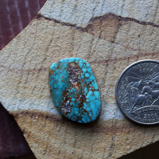 15 carat deep blue Stone Mountain Turquoise cabochon with red webbing