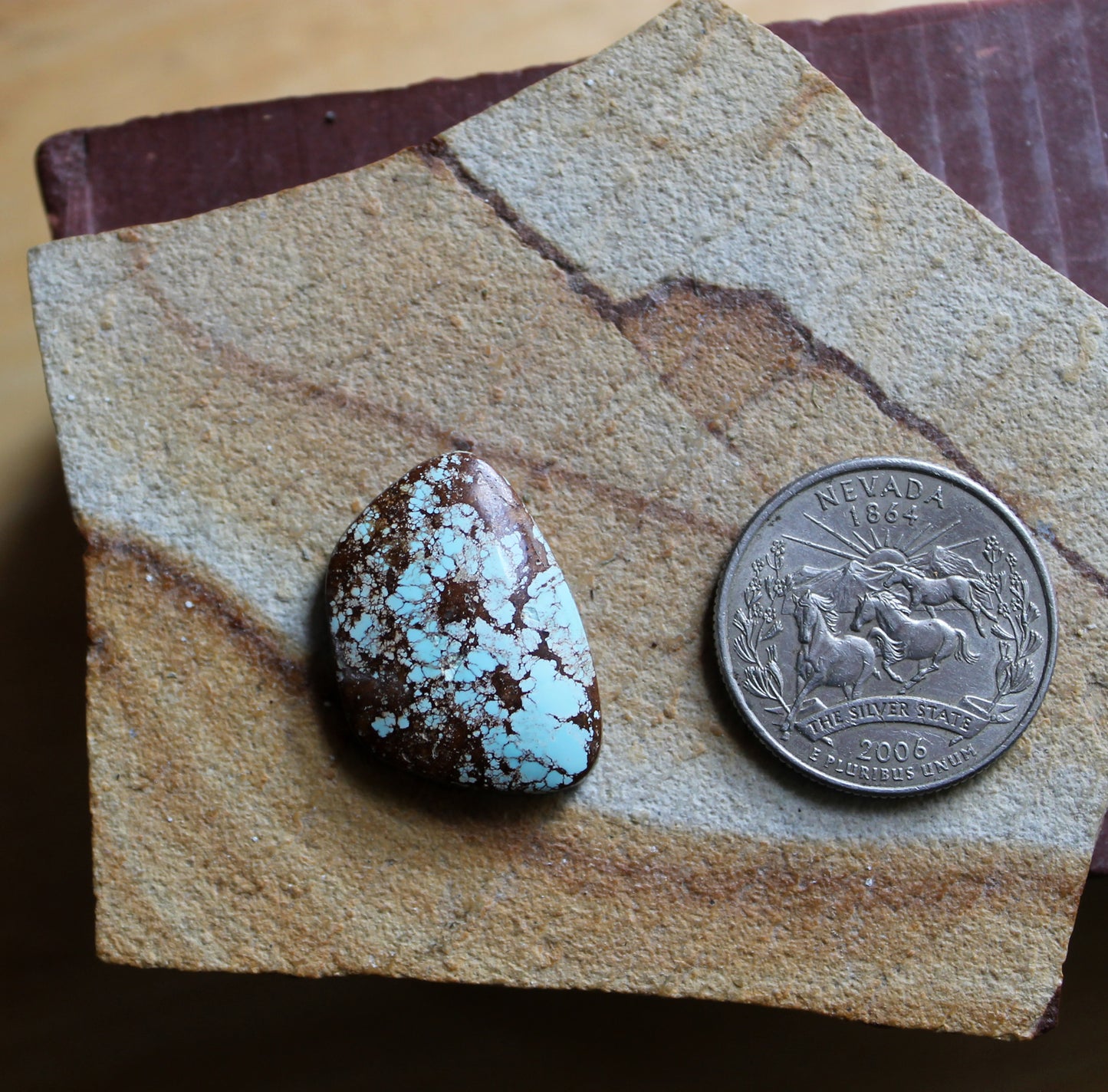 18 carat blue Stone Mountain Turquoise cabochon with red matrix