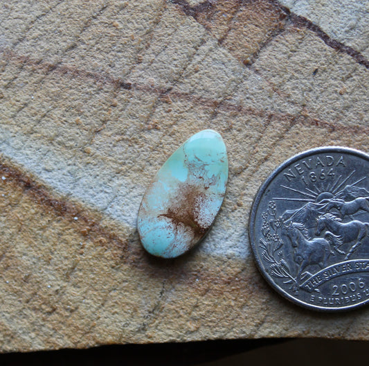 5 carat light blue Stone Mountain Turquoise cabochon with iron inclusions