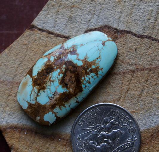 33 carat blue Stone Mountain Turquoise cabochon with red matrix