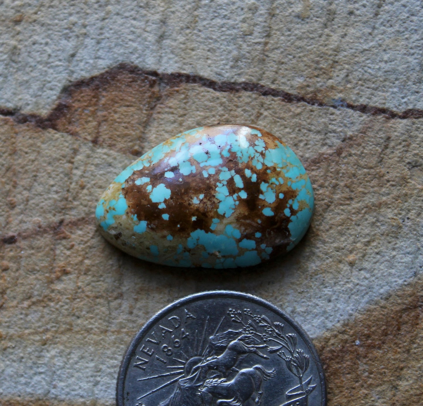 15 carat blue Stone Mountain Turquoise cabochon with red matrix