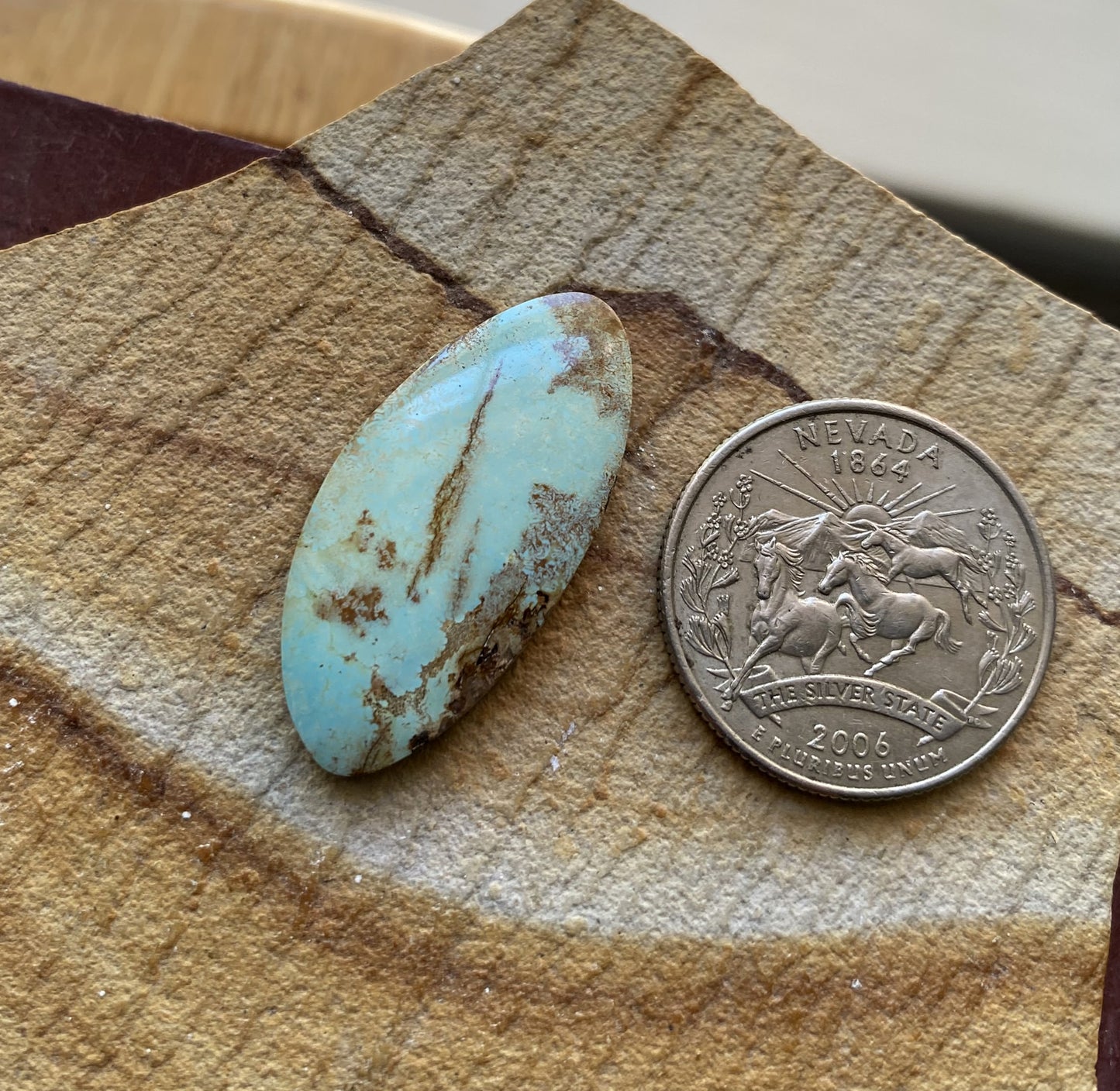 14 carat natural light blue Stone Mountain Turquoise cabochon with iron inclusions