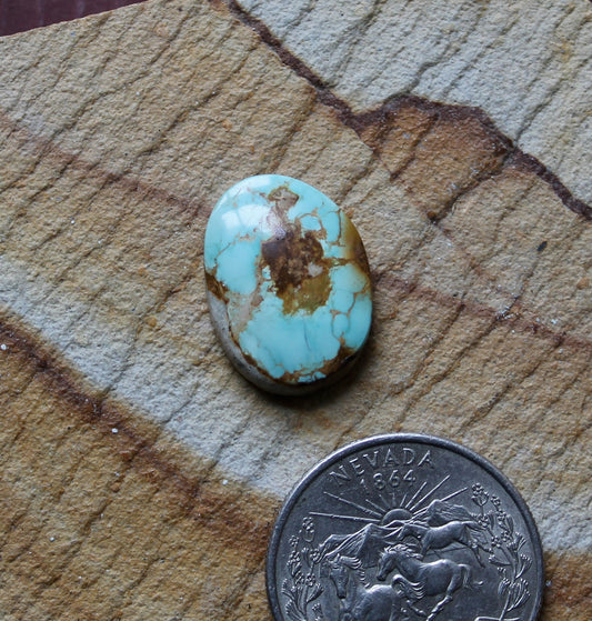 9 carat blue Stone Mountain Turquoise cabochon with red matrix