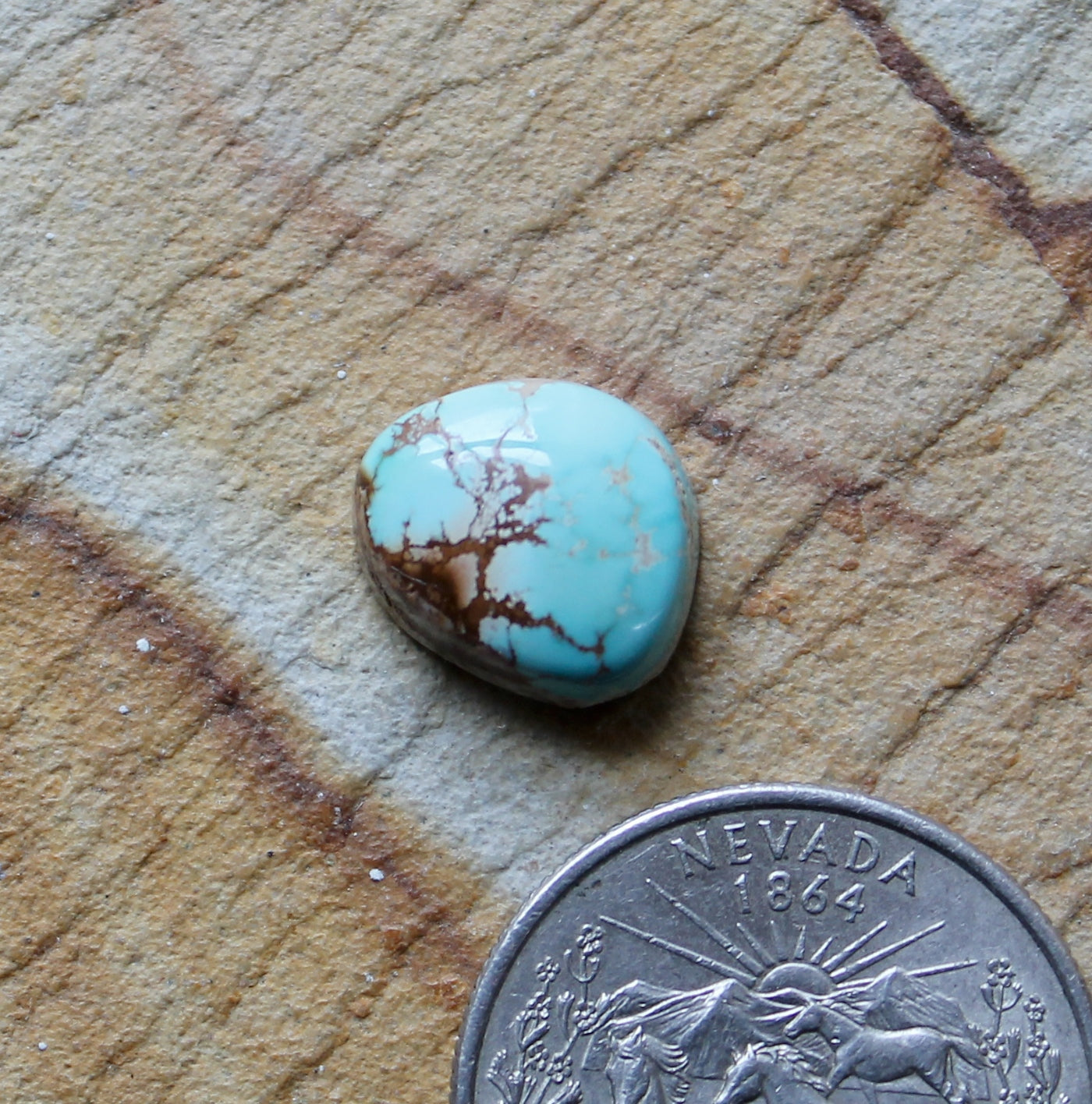 6 carat blue Stone Mountain Turquoise cabochon with red matrix