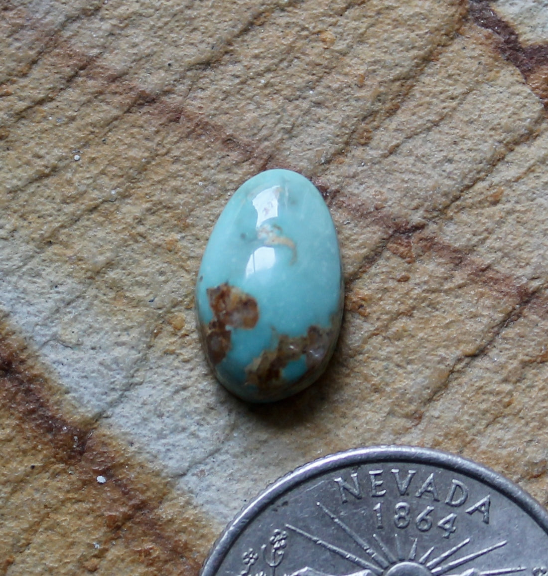 4 carat blue Stone Mountain Turquoise cabochon with red matrix