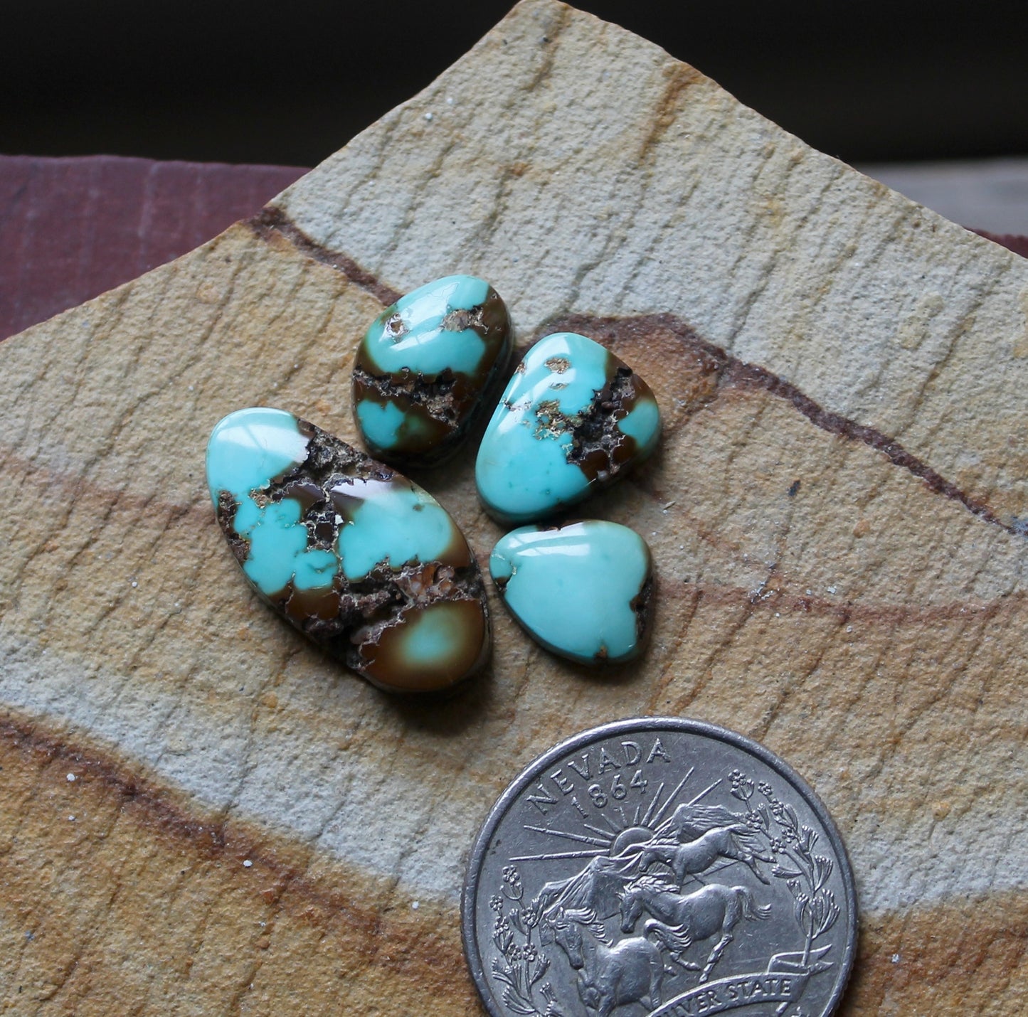 Blue Stone Mountain Turquoise cabochons with red matrix