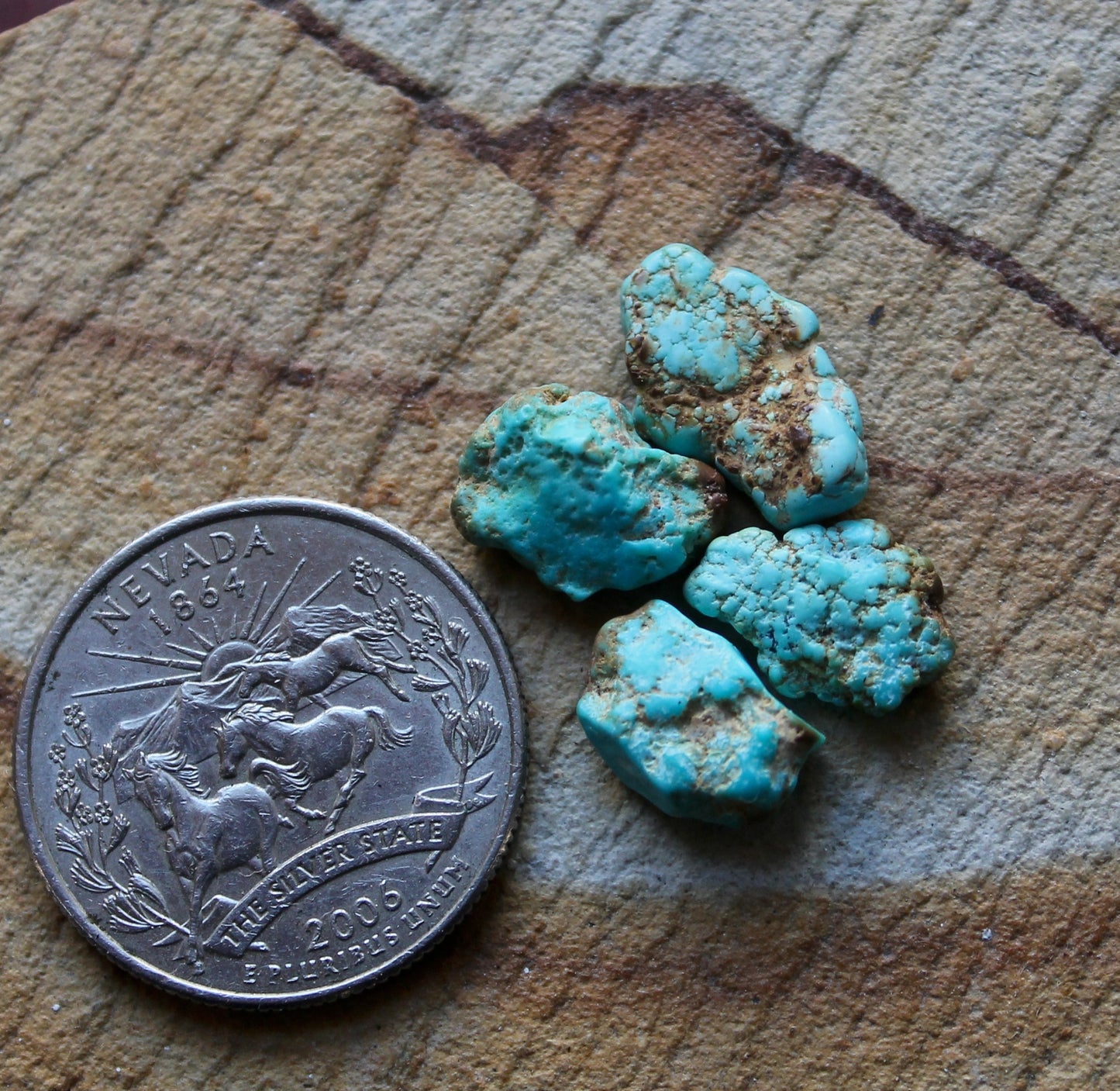 2 grams blue Stone Mountain Turquoise nuggets with red matrix