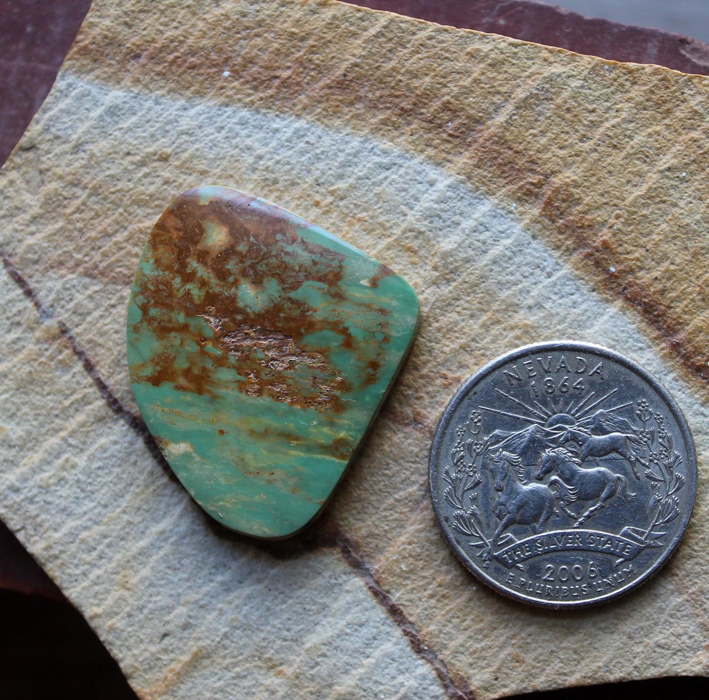 25 carat green Stone Mountain Turquoise cabochon with red matrix