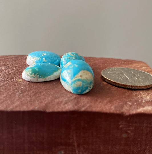 22 carat vivid blue Stone Mountain Turquoise cabochons with white matrix